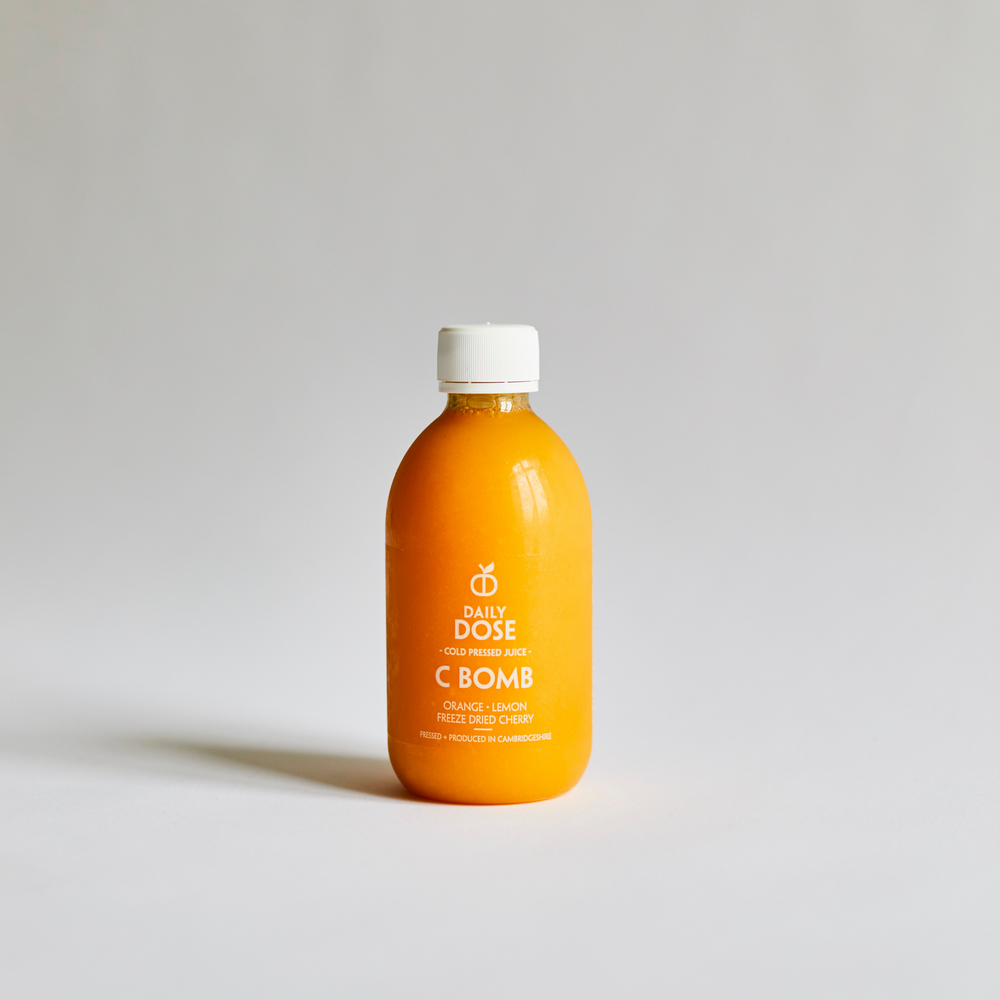 Daily Dose Cold Pressed C Bomb. Orange juice high in vitamin c.